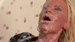 This blonde MILF has her sexy boobs creamed on
